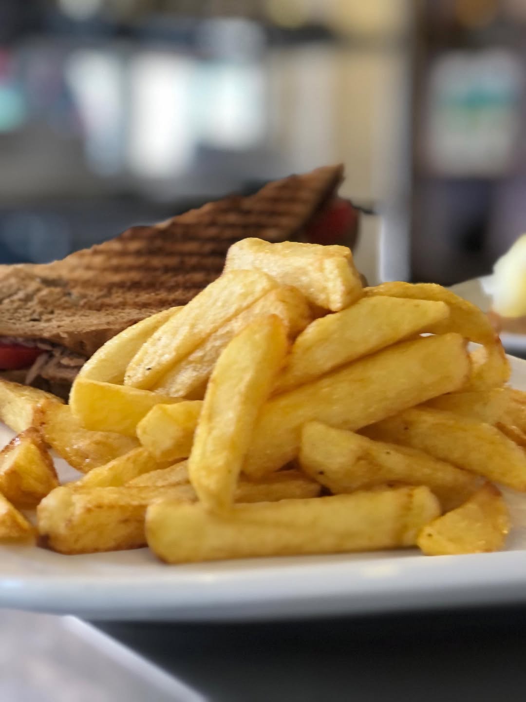 Flaky golden butter fries served with jam and fresh coffee